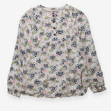 White blouse with navy and yellow floral