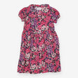 Navy dress with bold pink and purple flowers