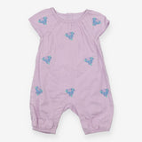 Purple romper with embroidered flowers