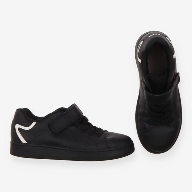 Trainers black white marks on heel velcro