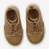 Brown trainers white soles