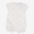White shortie romper beach ball bunnies