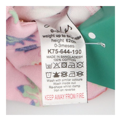 Sleepsuit pink large flowers poppers