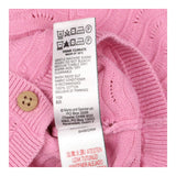 Pink knit cardigans with wooden button