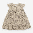 Dress sleeveless cream with black dots