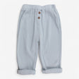Trousers baby blue ribbed with brown buttons