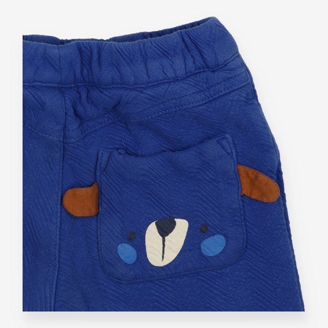 Blue joggers with bear pocket