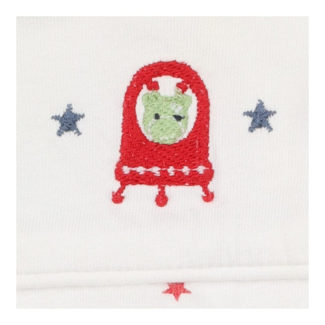 White sleeping bag with red stars and alien