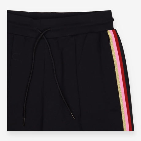 Black wide leg joggers with vivid rainbow stripe d