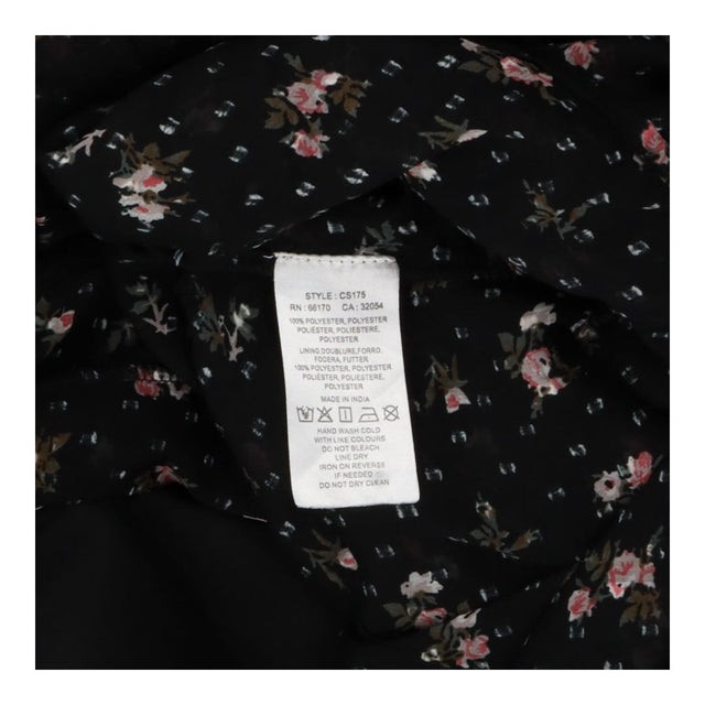 Black floral slip dress, puff sleeves