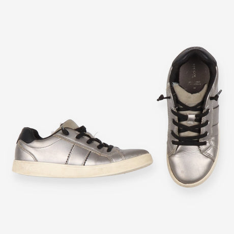 Grey trainers, black laces