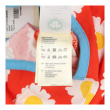 Red daisy short romper with blue seams