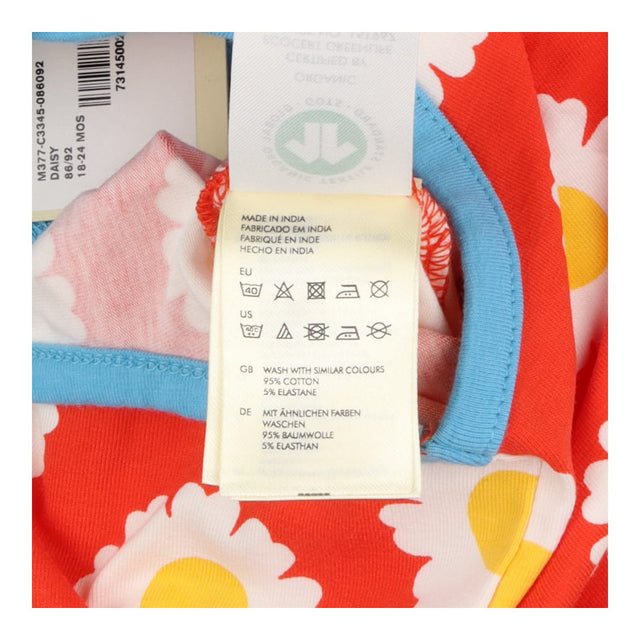 Red daisy short romper with blue seams