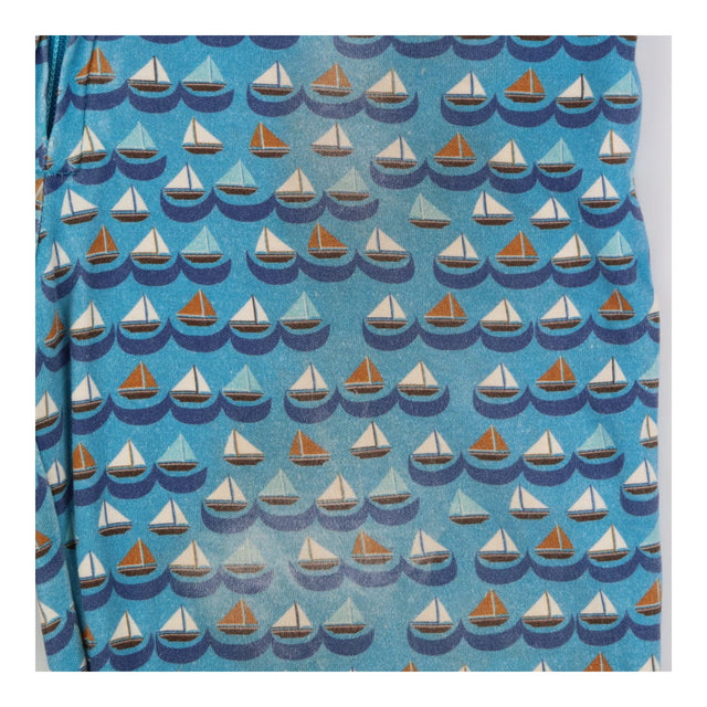 Onesie blue boats with orange lining 
