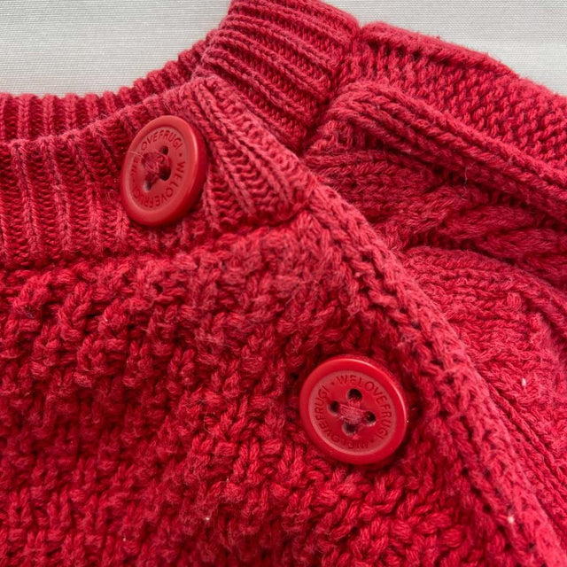 Red moss stitch sweater with rainbow stripe
