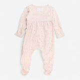Pink sleepsuit white rabbits 