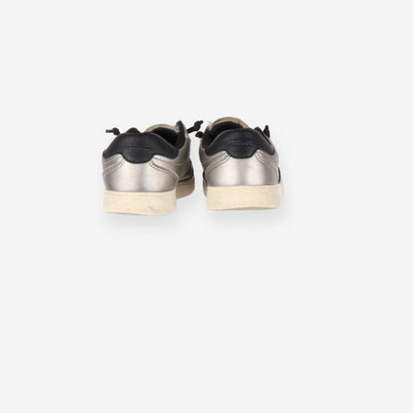 Grey trainers, black laces