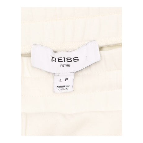 Wide-Leg Joggers in Ivory Premium Interlock Jersey