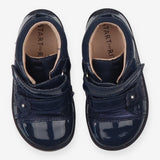 Discover Navy Patent Boots